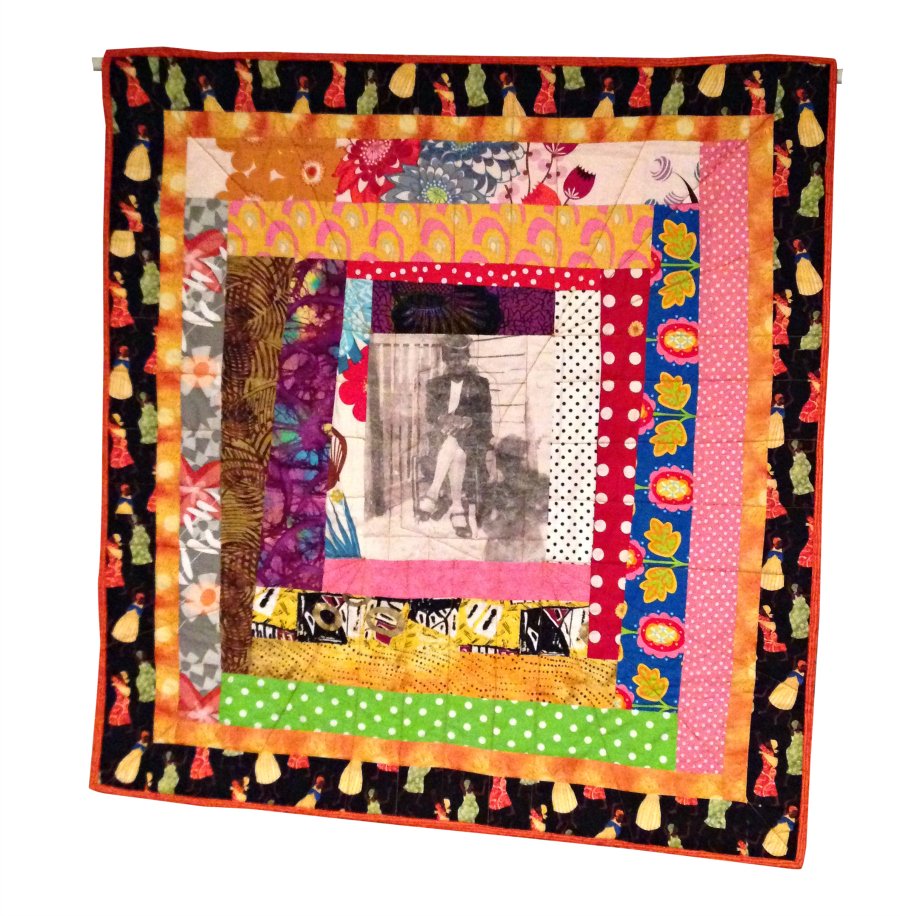 Wambui Made It: I was able to print a picture of my mother on a light-colored fabric. Then, I started pricing fabric around the fabric with the photo on it. 'My Mama Quilt' (front)